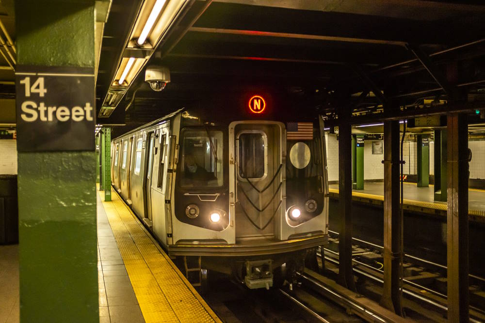 Image of an N train at the 14th street subway station in NYC