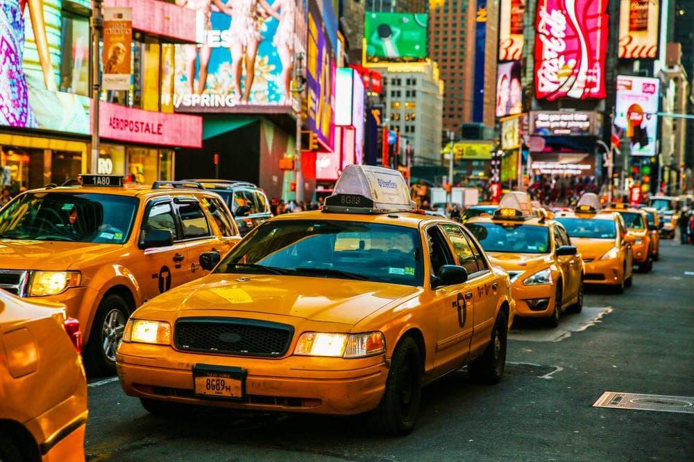 Image of Yellow cabs in NYC in traffic.