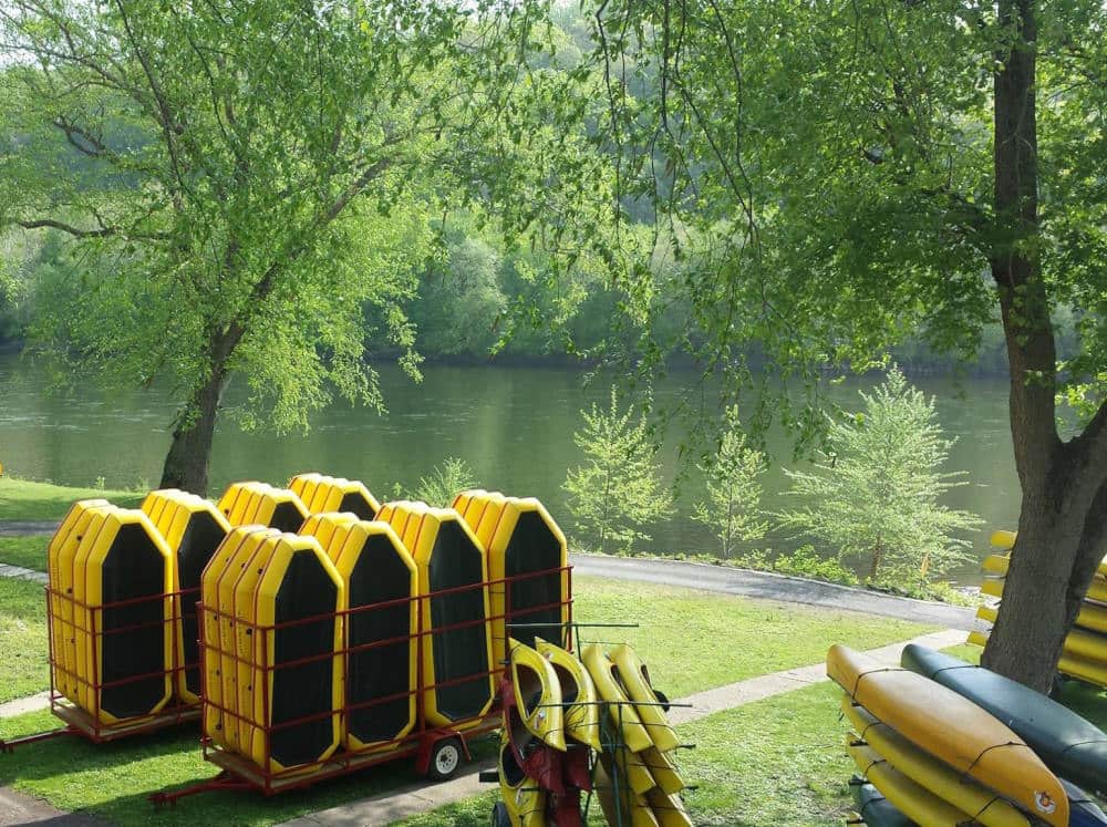 Image of rafts by the river at Bucks County River Country Tubing in point Pleasant PA