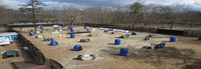 Photo of AC Paintballs outdoor paintball field in Williamstown Nj with obsticals and random places for cover