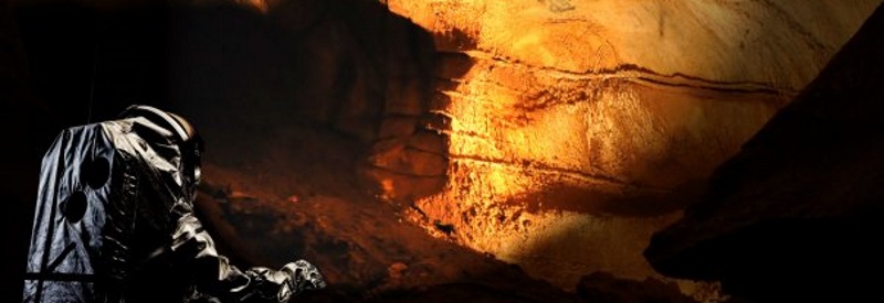 Image of a astronaut exploring a Martian cave.