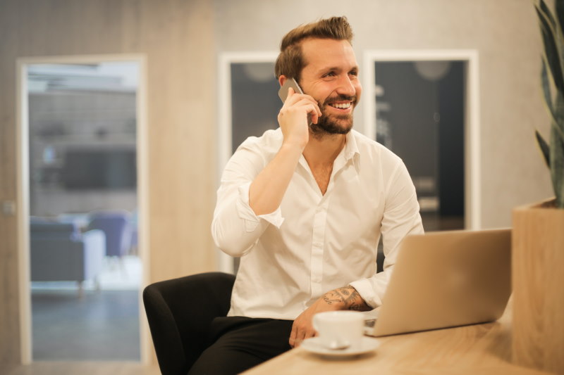 Image of an entrepreneur working on his laptop