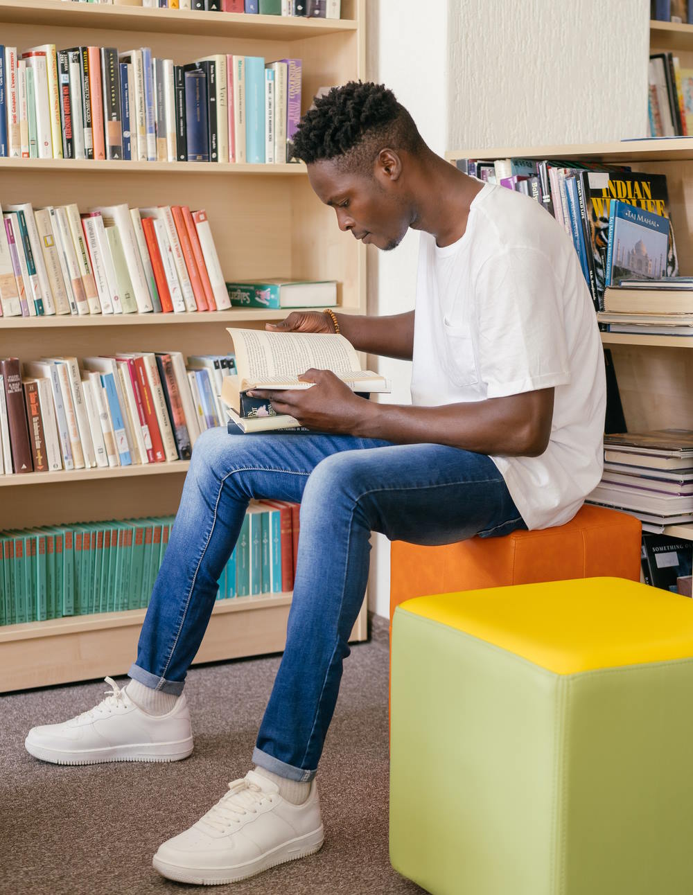 A man studying in a library in NJ