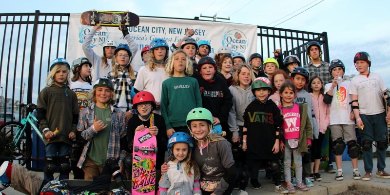 Image of children holding skateboards at the Ocean City Skate Park in NJ.