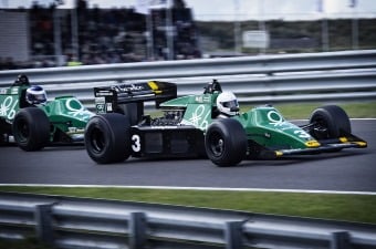 Image of a man driving a race car showing auto race track as one of the New Jersey sports