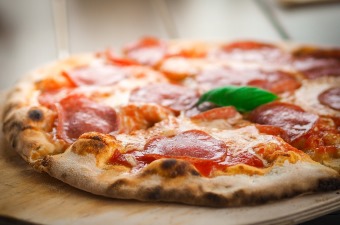 Image of a pepperoni pizza at one of the best bars in NJ