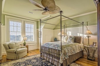 Photo of a bed in a decorated room showing bed and breakfasts as one of the best New Jersey Getaways