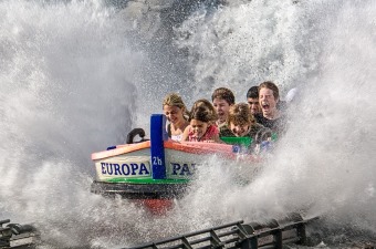 Image of kids in a boat ride going down a hill through water as one of the best things to do at the Jersey Shore