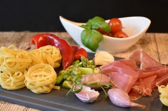 Image of pasta sliced meats tomatoes and mozzarella showing the best restaurants by cuisine in NJ