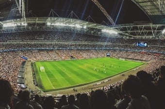 Top view of a football field and fans at a stadium in NJ