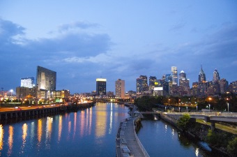 Image of Philadelphia in front of the water showing a day trip that lies beyond New Jersey