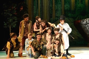 Image of children and older people on a stage as part of an acting school in NJ