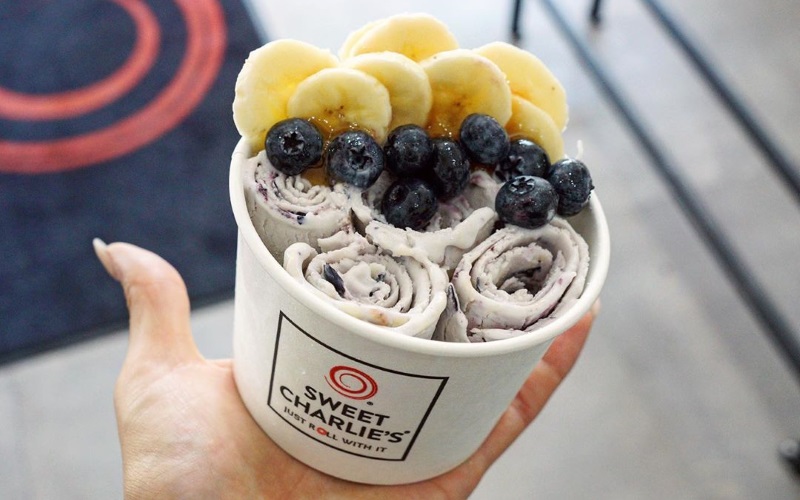 Hand rolled Ice cream cup with fruit on top